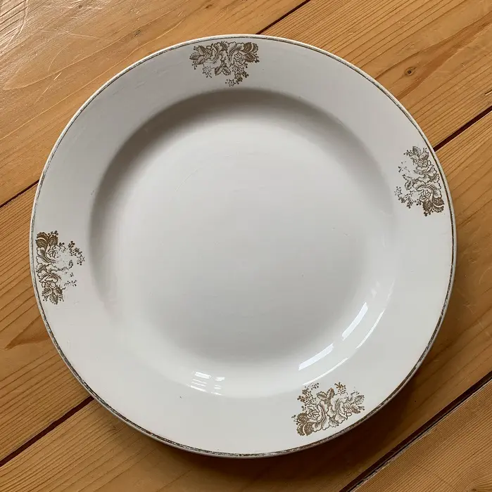 BOCH La Louvière groot plat bord met gouden bloemmotief